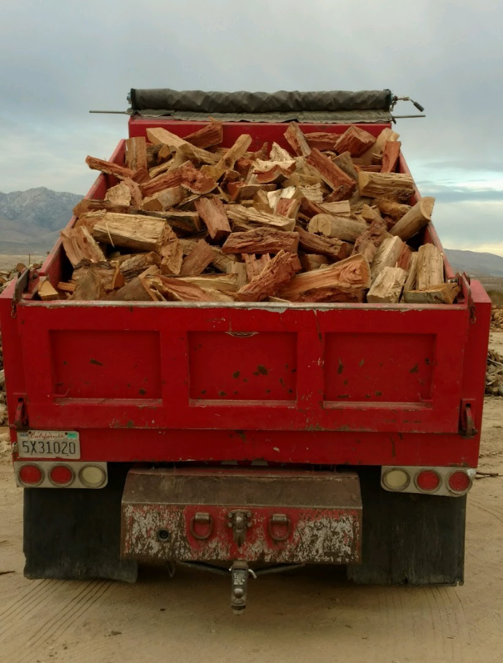 Truck loaded with split firewood for Blue Mountain Firewood delivery